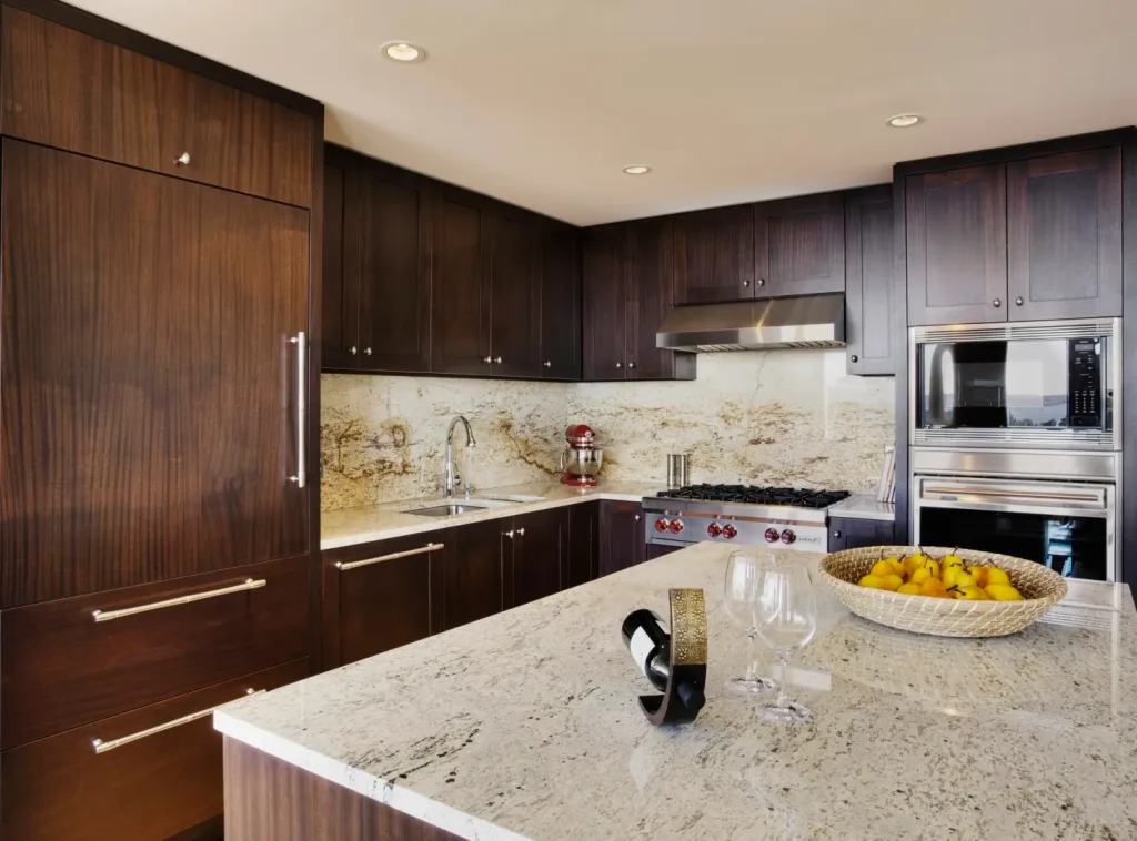 Kitchen islands example showing a granite island used for food preparation.
