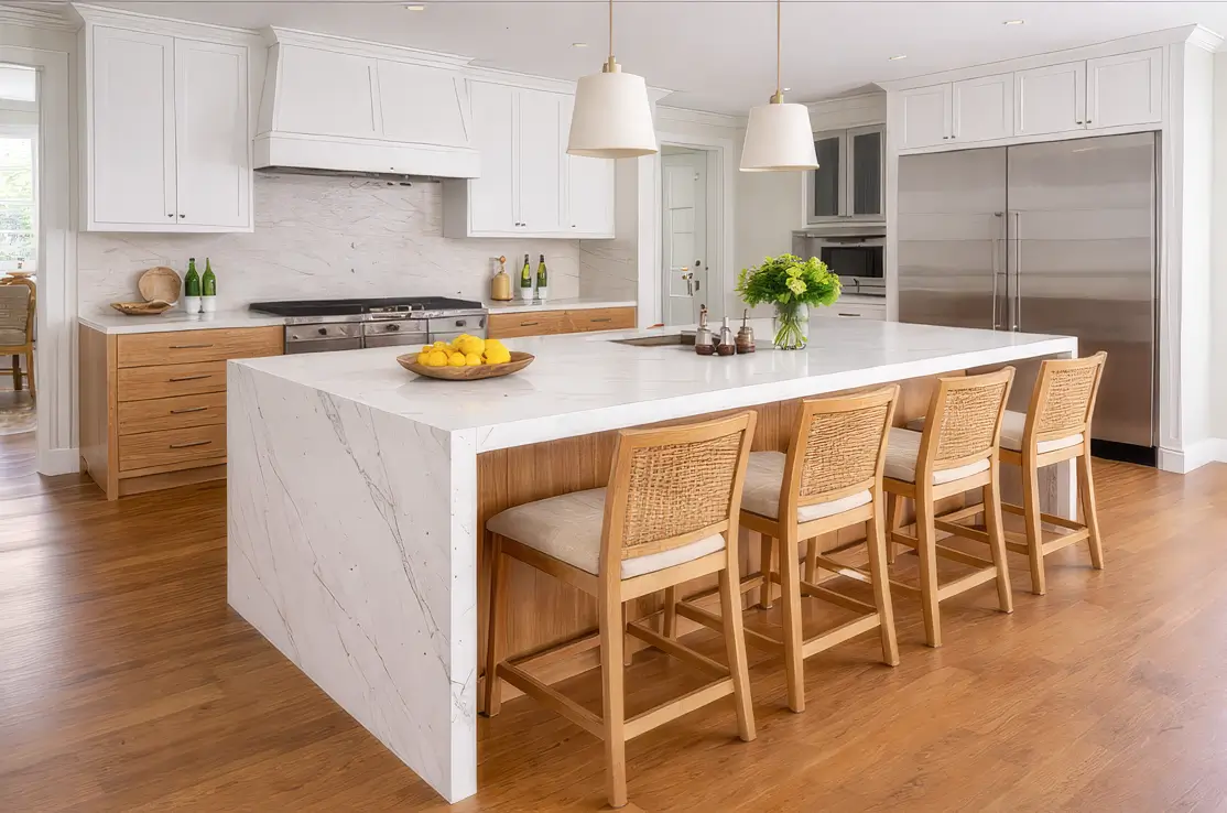 Stylish kitchen islands example featuring waterfall edge surface design.
