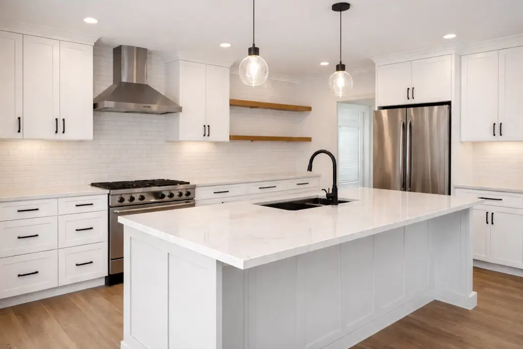 Kitchen remodeling project showing modern cabinets and quartz countertops.